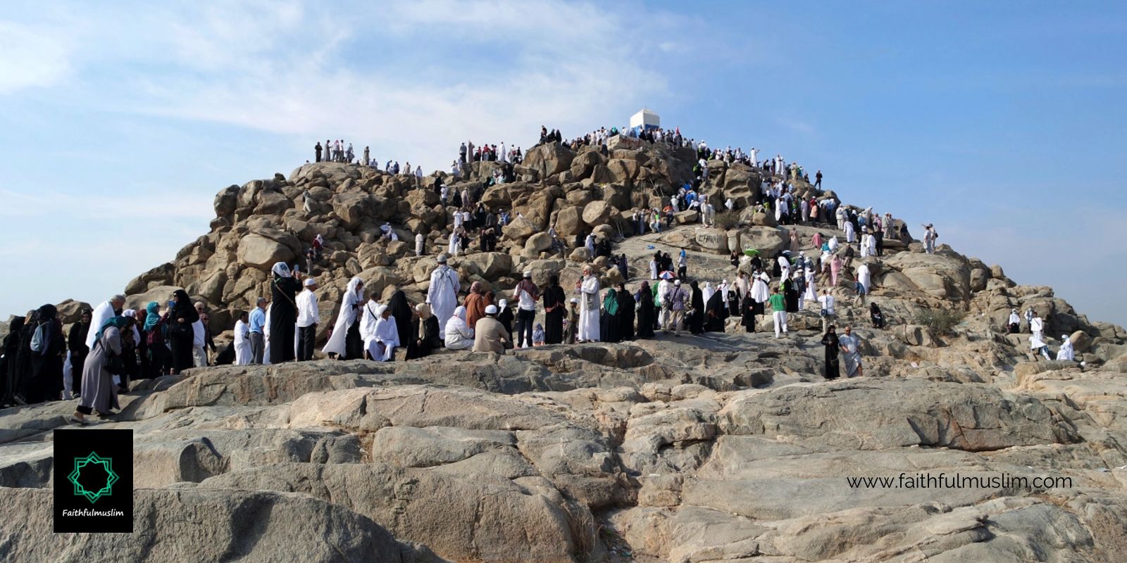 Pilgrims climbing a hill in Arafah